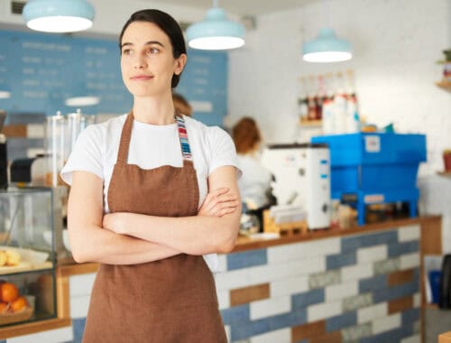 Barista looking outside, source: Shutterstock