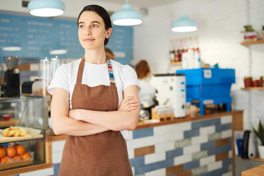 Barista looking outside, source: Shutterstock