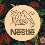 Nestle logo, cocoa fruit background, source: Food & Wine / Nestlé / Getty Images