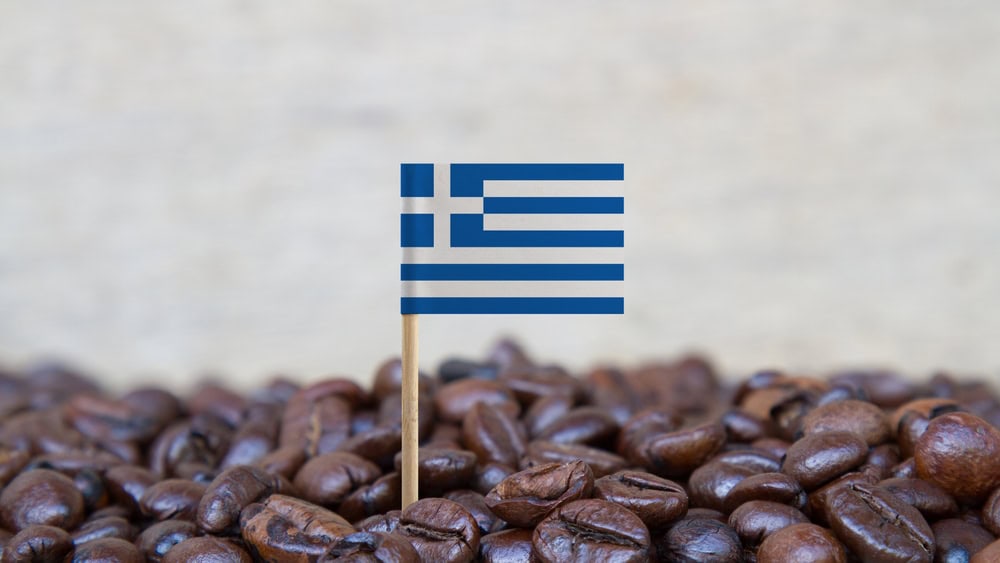 Greek flag on coffee beans, source: Shutterstock