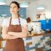 Barista looking outside, source: Shutterstock