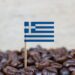Greek flag on coffee beans, source: Shutterstock